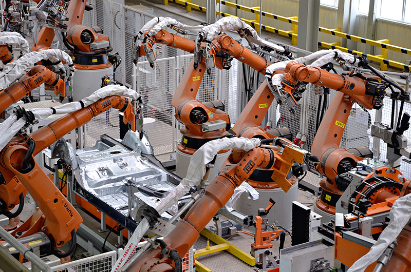 Stručná historie průmyslových robotů
